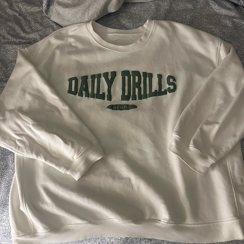 Daily Drills White Tee with Green Tag
